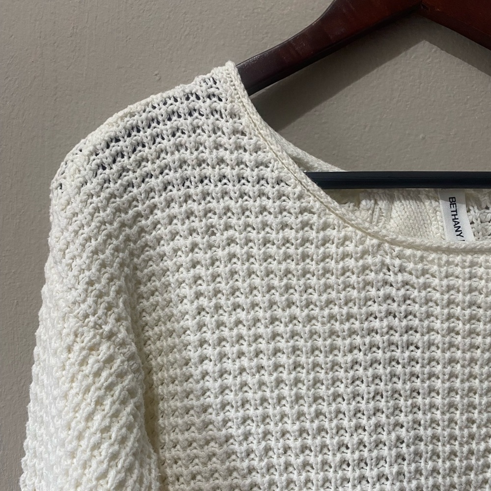 White knit sweater with open back